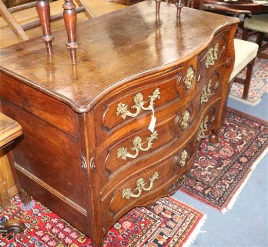 An 18th century French fruitwood serpentine commode, W.4ft D.2ft 2in. H.2ft 10in.